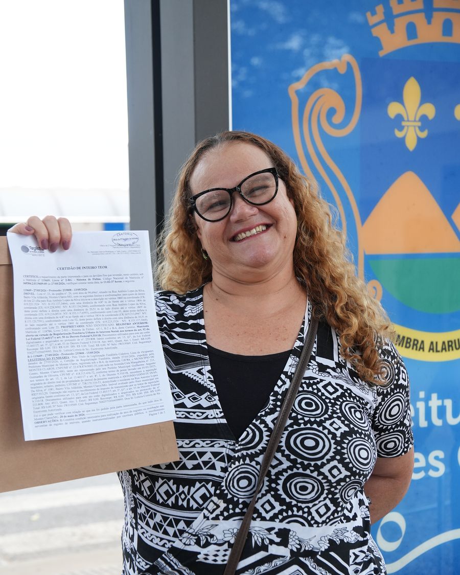 Família com o título de propriedade